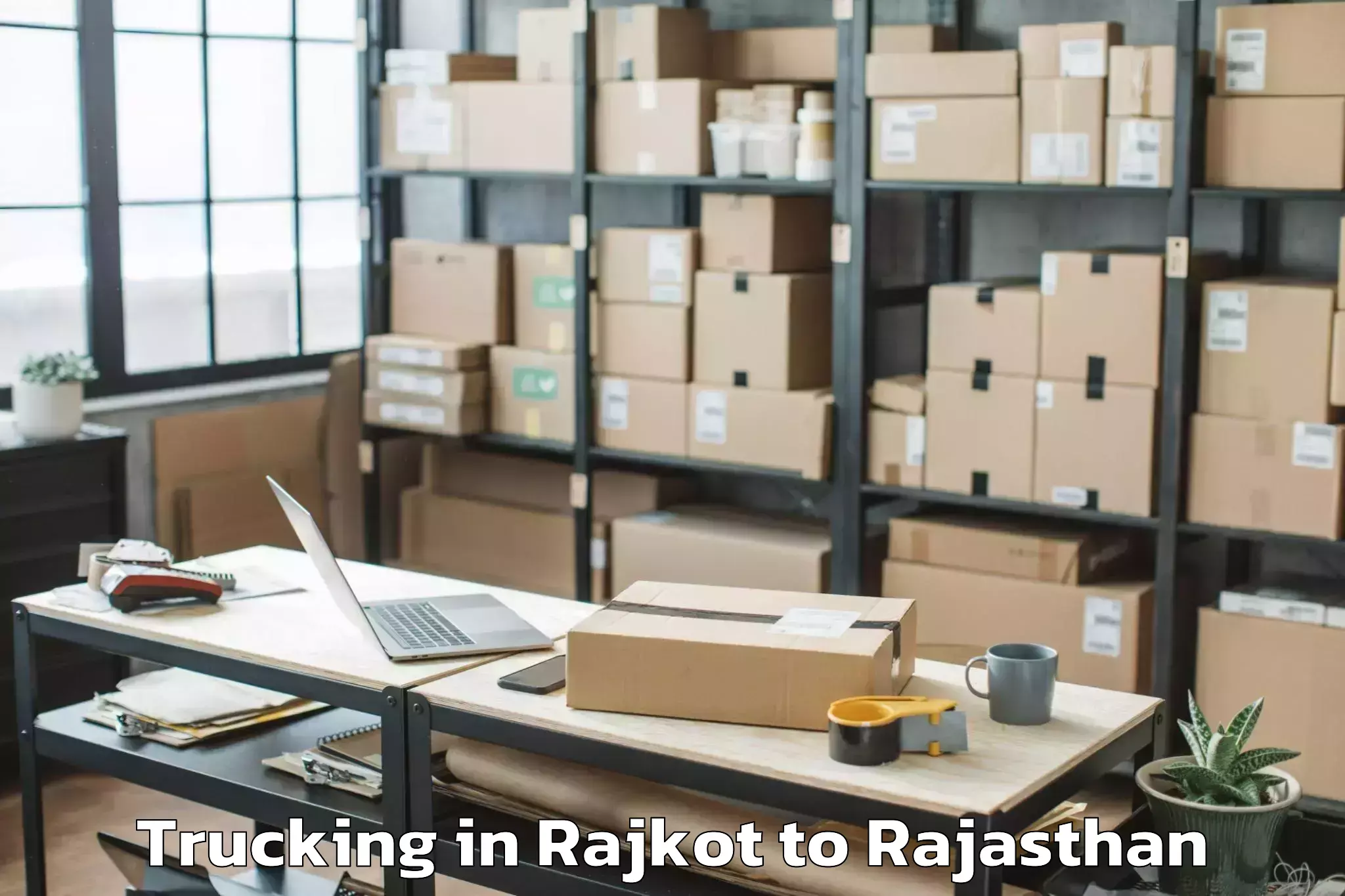 Book Rajkot to Sheoganj Trucking Online